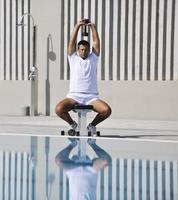 Exercising by pool photo