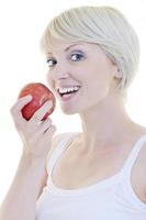 happy  young  woman eat green apple isolated  on white photo