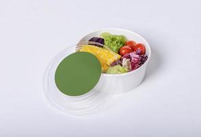 Takeaway food container round box mockup with vegetable and fruit, copy space for your logo or graphic design photo