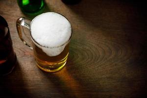 Glass of Light Beer with wheat on the bar counter, copy space for your text photo