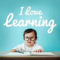 New born or Little asian girl and blackboard with I love learning, Education concept photo
