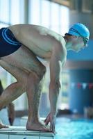 Swimming in indoor pool photo