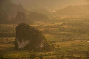 The scenery of Pha Chang Noi in Phu Lung ka forest park during the sunrise located in Phayao province of Thailand. photo