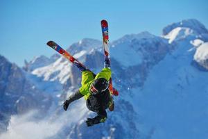 Skiers on mountain photo