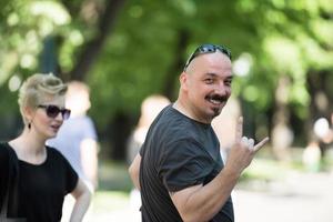 man showing a rock hand gesture photo