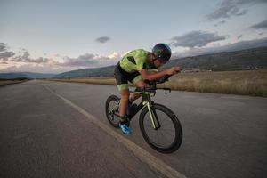 triathlon athlete riding a  bike photo