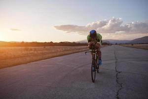 triathlon athlete riding a  bike photo