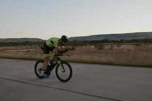 triathlon athlete riding a  bike photo