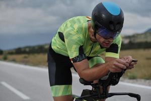 triathlon athlete riding bike photo