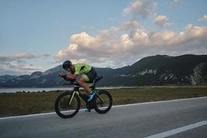 triathlon athlete riding bike photo