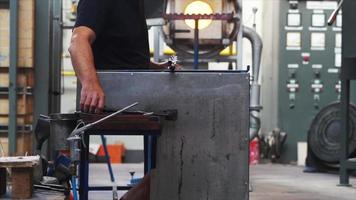 Man doing glass work in a studio video