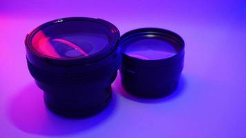 Photographic Lens on purple Background photo