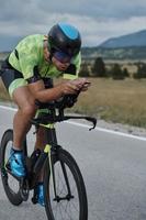 triathlon athlete riding bike photo