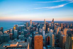 Aerial view of Chicago downtown skyline at sunset photo