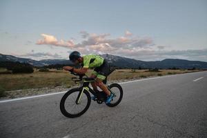 triathlon athlete riding bike photo