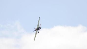 KAZAN, RUSSIAN FEDERATION, JUNE 14, 2019 - Plane flies and performs tricks with smoke. Concept sports and extreme. Red Bull Air Race World Championship. video