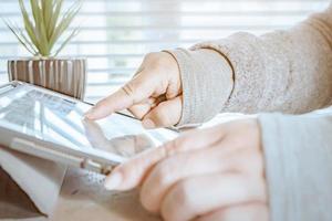woman using laptop, searching web, browsing information, Close up of business women working with typing on laptop empty at workplace.Selective focus photo
