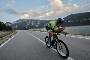 triathlon athlete riding bike photo