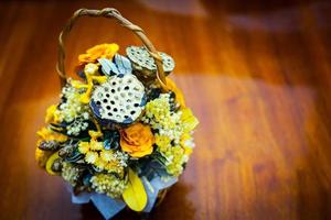 Dried floral bouquet in a basket photo