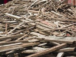 Pile of old used timber planks photo