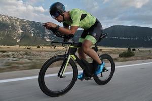 triathlon athlete riding bike photo