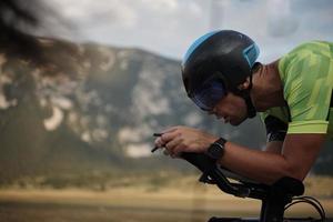 triathlon athlete riding bike photo