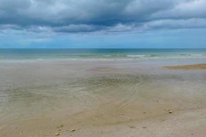 Beautiful sea in the morning with rain cloud on Thailand. photo