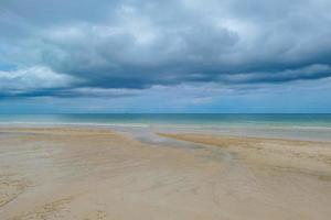 Beautiful sea in the morning with rain cloud on Thailand. photo