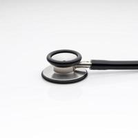 The diaphragm of medical stethoscope isolated on a white background photo