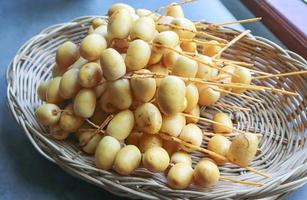 Fresh dates on a tray photo