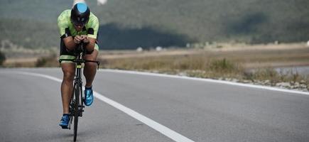 triathlon athlete riding bike photo