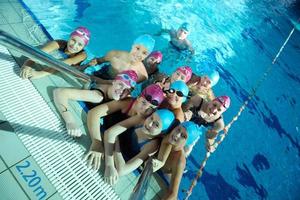 happy childrens at swimming pool photo