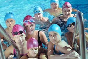 happy children group  at swimming pool photo