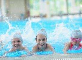 children group  at swimming pool photo