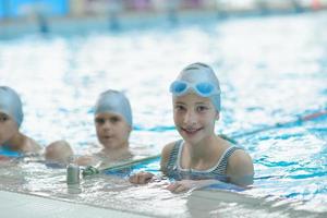 children group  at swimming pool photo