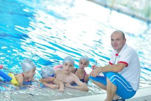 children group  at swimming pool photo