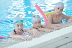 children group  at swimming pool photo