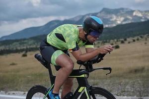 triathlon athlete riding bike photo