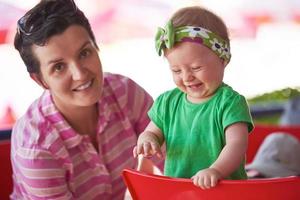 portrait of happy young mother and baby photo