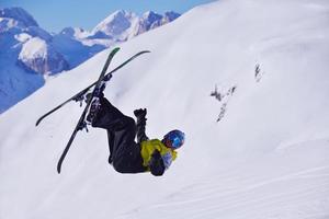 Skiers on mountain photo