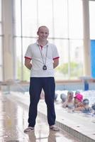 children group  at swimming pool photo