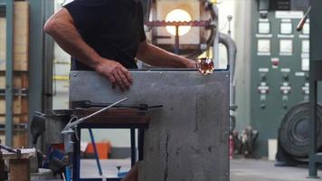 Man doing glass work in a studio video