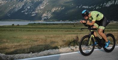 triathlon athlete riding bike photo