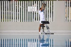 Exercising by pool photo