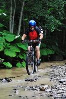 Riding a mountain bike photo