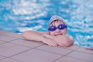 happy child on swimming pool photo