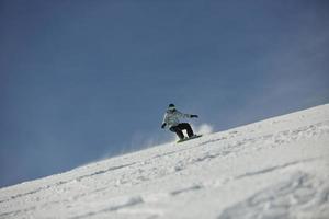 Skiers on mountain photo