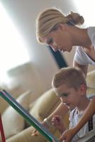 family drawing on school board at home photo