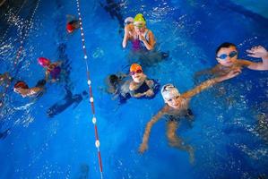 Swimming in indoor pool photo