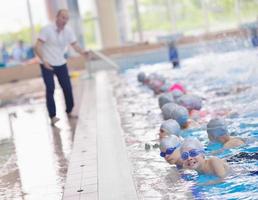 children group  at swimming pool photo